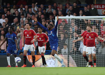 Chelsea and Manchester United players react during a tense moment in their Premier League match at Stamford Bridge