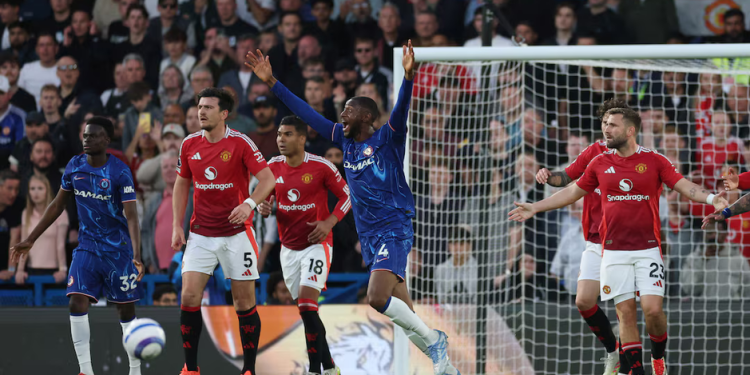 Chelsea and Manchester United players react during a tense moment in their Premier League match at Stamford Bridge