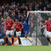 Chelsea and Manchester United players react during a tense moment in their Premier League match at Stamford Bridge