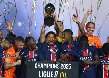 Paris St Germain's Marquinhos lifts the Ligue 1 trophy (Reuters)