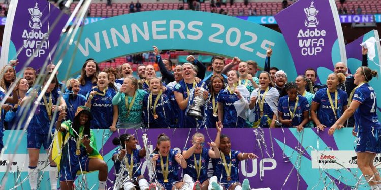 Chelsea women lift the fa cup with at Wembley