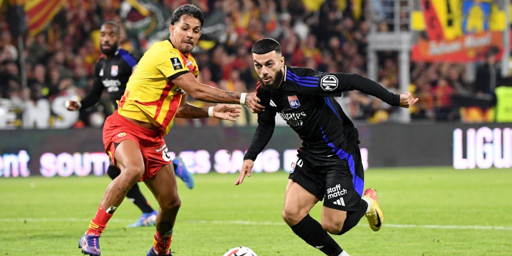 Georges Mikautadze and Facundo Medina during the Ligue 1 MCDonald's match between Lens and Lyon (Imagn)