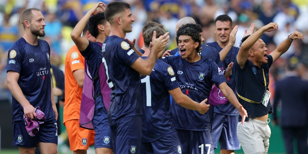 Auckland City players celebrate after holding off Argentinian giants Boca Juniors (Imagn)