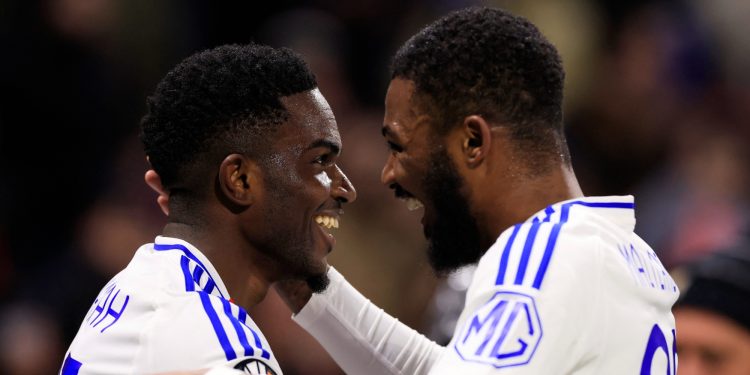 Lyon's Ernest Nuamah and Ainsley Maitland-Niles (Reuters)