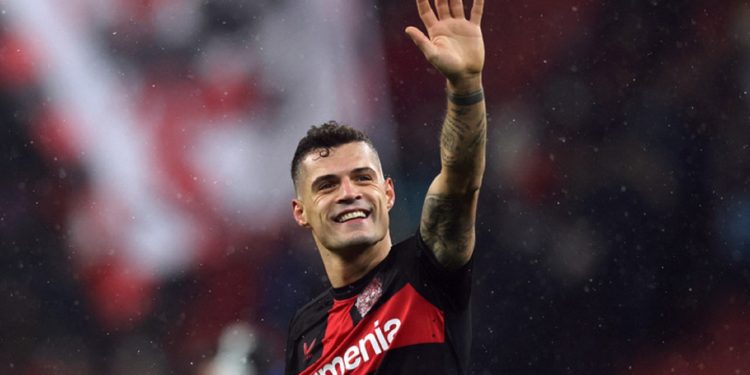 Granit Xhaka waves to fans (Reuters)