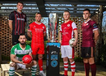 The Irish Premier Divison trophy surrounded by players (LOI)
