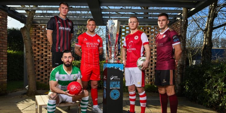 The Irish Premier Divison trophy surrounded by players (LOI)