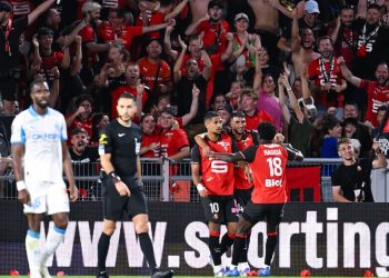 Ludovic Blas celebrates with teammates during the Ligue 1 match between Stade Rennais FC and Olympique de Marseille (Imagn)