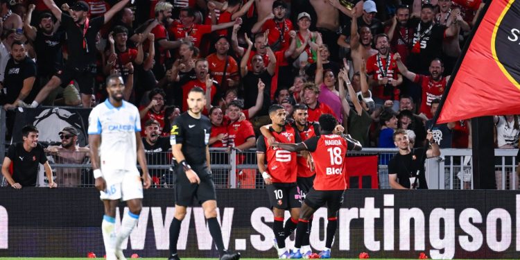 Ludovic Blas celebrates with teammates during the Ligue 1 match between Stade Rennais FC and Olympique de Marseille (Imagn)