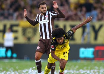 Dortmund's Karim Adeyemi and St. Pauli's Danel Sinani during their Matchday 1 fixture. (Reuters)
