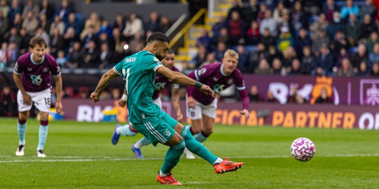 Salah scores a last-minute penalty vs Burnley (Reuters)