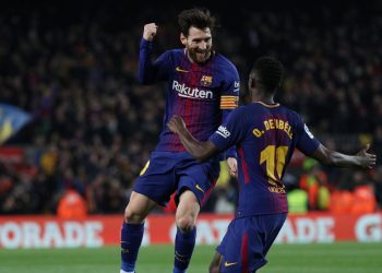 Dembele and Messi celebrate a goal together during their time at Barcelona (Reuters)