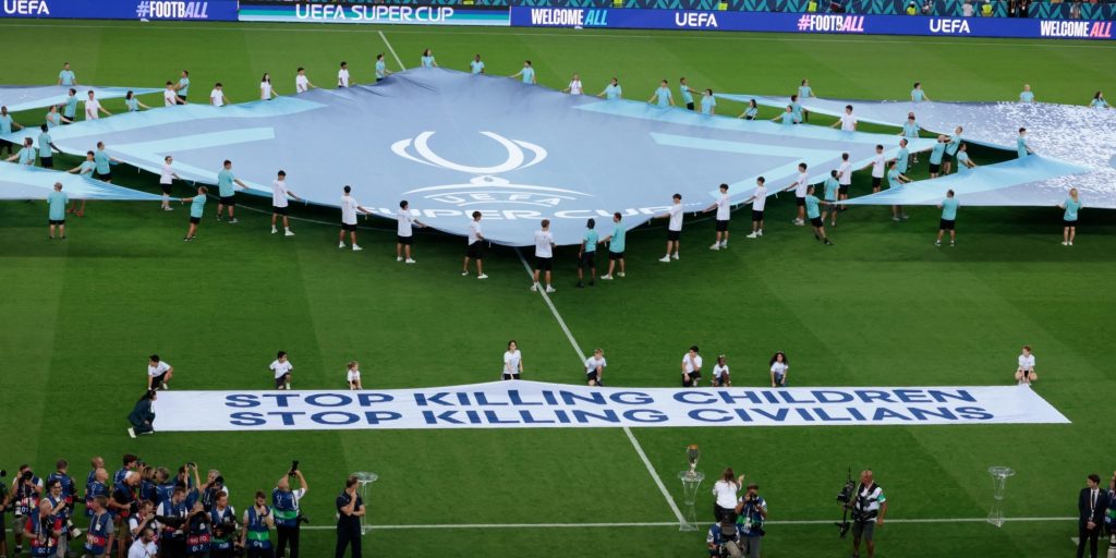 UEFA drew criticism from pro-Israel sides for their "Stop Killing Children" banner at the Supercup final (Imagn)