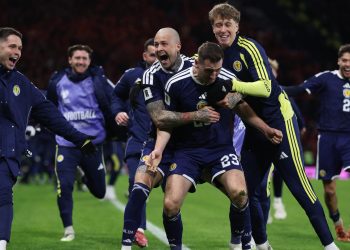 Scotland's Kenny McLean celebrates scoring their fourth goal (Reuters)