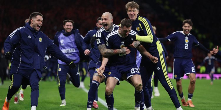 Scotland's Kenny McLean celebrates scoring their fourth goal (Reuters)