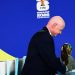 FIFA president Gianni Infantino holds the World Cup trophy after the playoffs draw (Reuters)